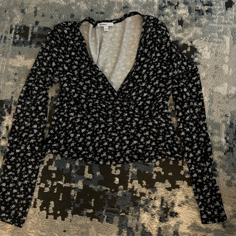 Black floral crop top from Subdued